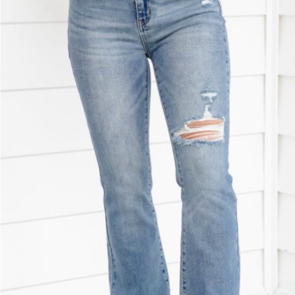 Judy Blue Mid Rise Medium
Wash Distressed Released Hem Bootcut - Picture 15 of 16